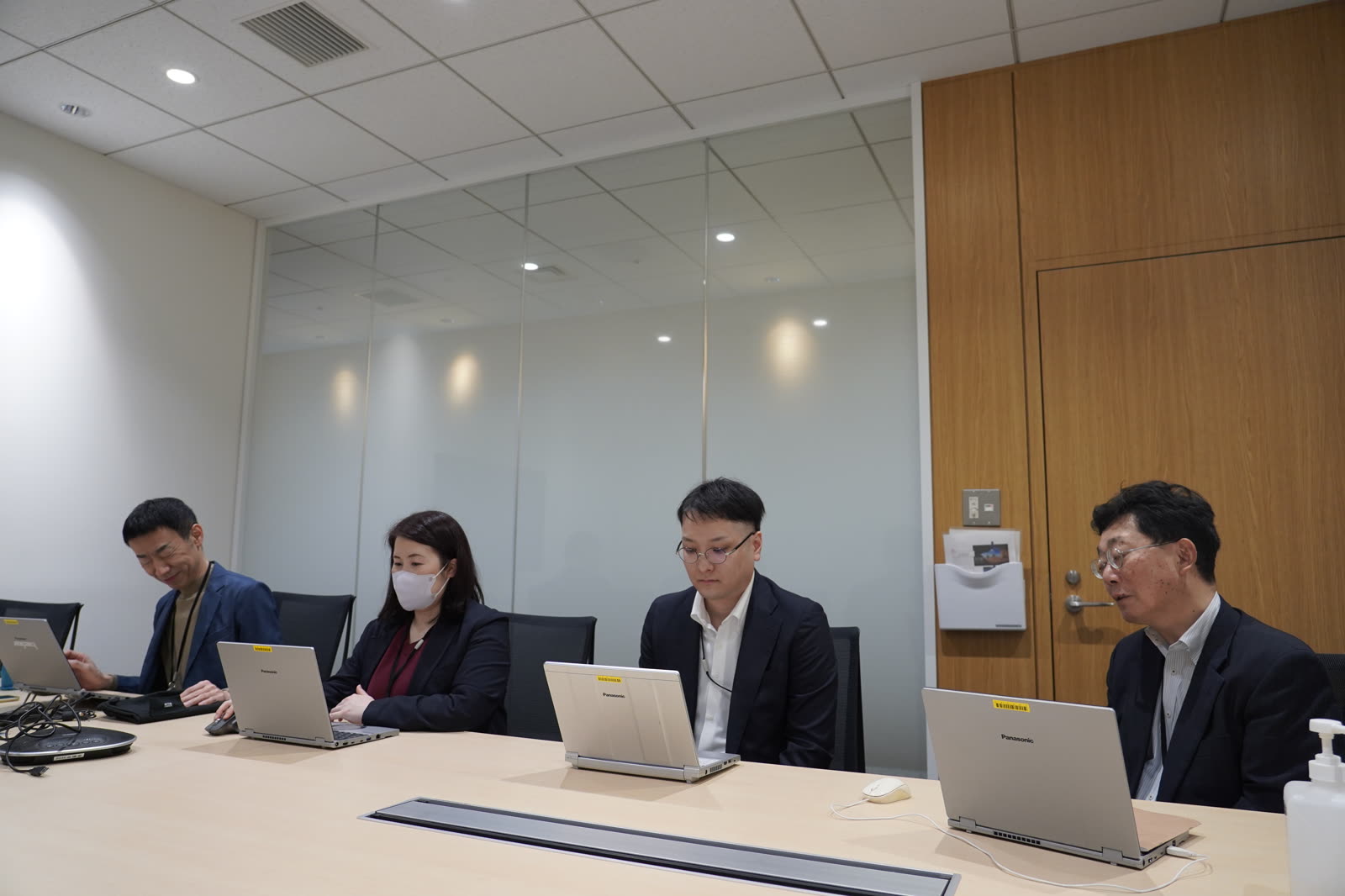 Denka head office meeting scene